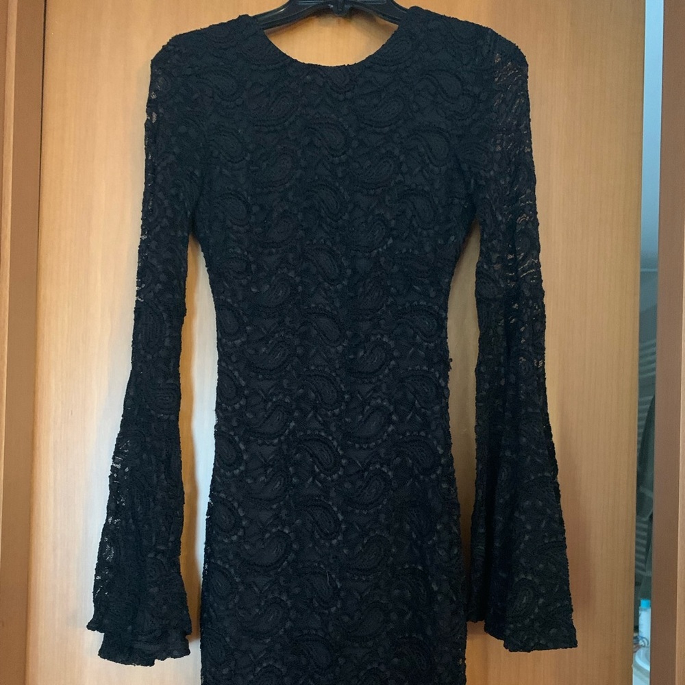Black lace Bodycon dress with long sleeves. Perfect for October/Halloween!